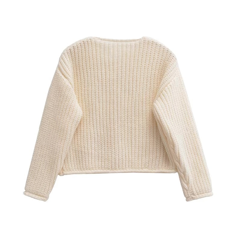 Rückansicht der Gerdyy Strickjacke in Beige – klassischer Strick für schicke Outfits