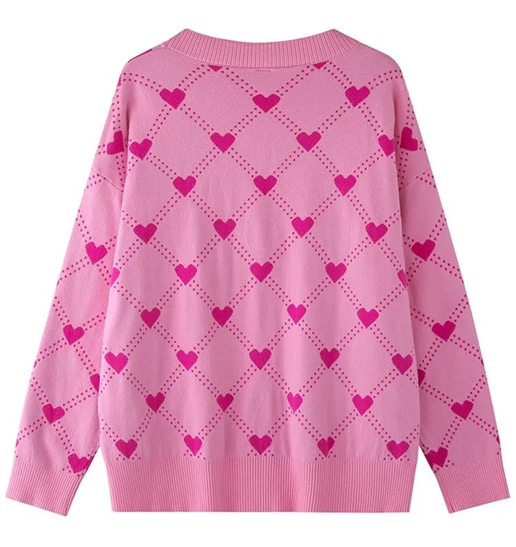 Rückansicht des Heartyy Heart Pinkyy Cardigan – weiche rosa Strickjacke mit verspieltem pinkem Herzdesign für feminine, gemütliche Outfits von CozyWoolCraft.